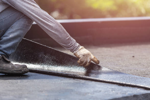 Professional Basement Waterproofing technician working in Lewistown, OH